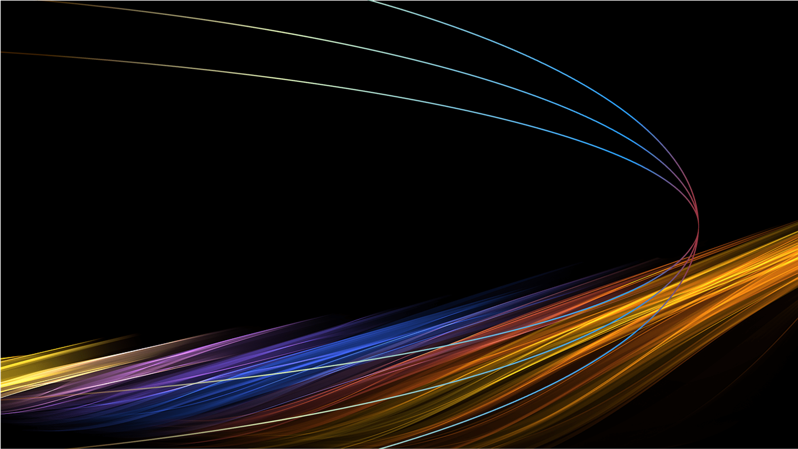 Coloured trails of light on a dark background