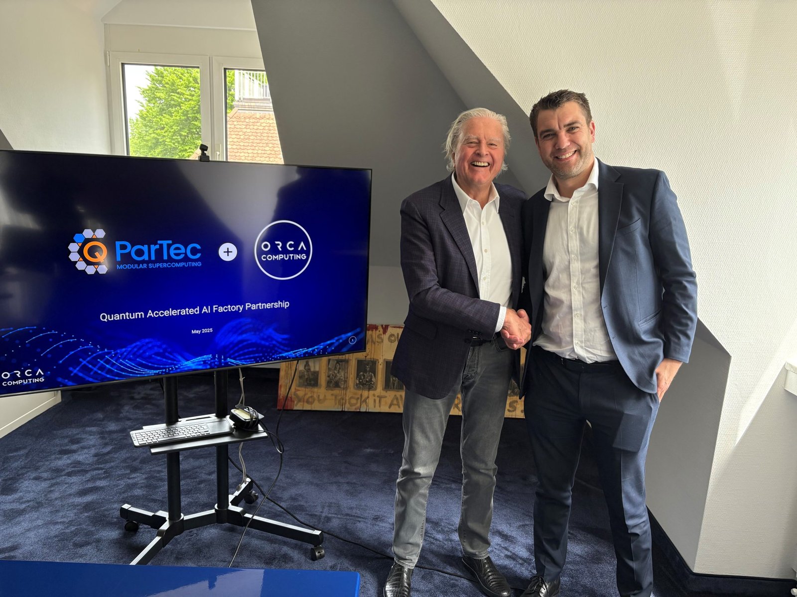 ParTec and ORCA Computing representatives at a partnership signing