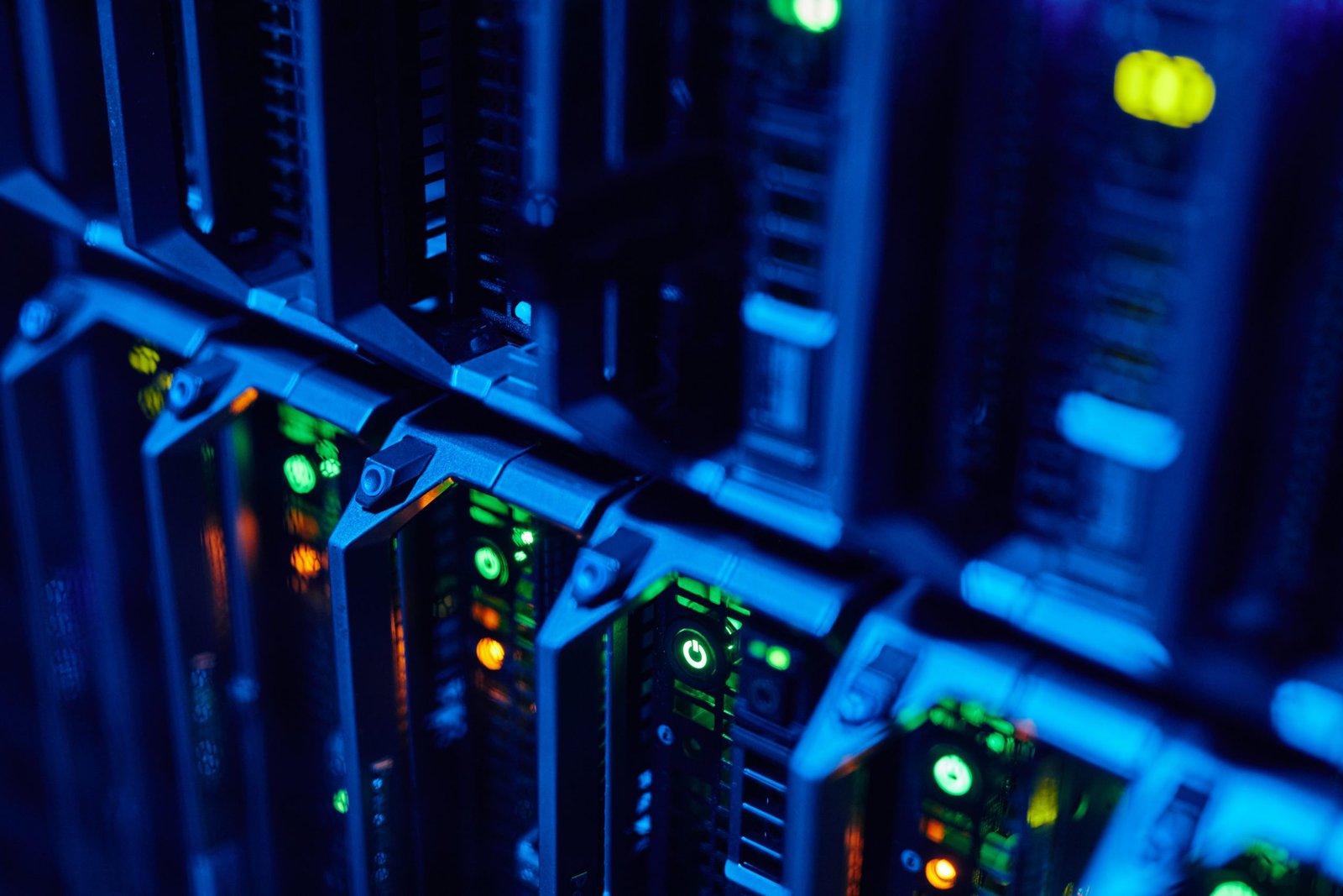 Server racks illuminated in blue in a data centre